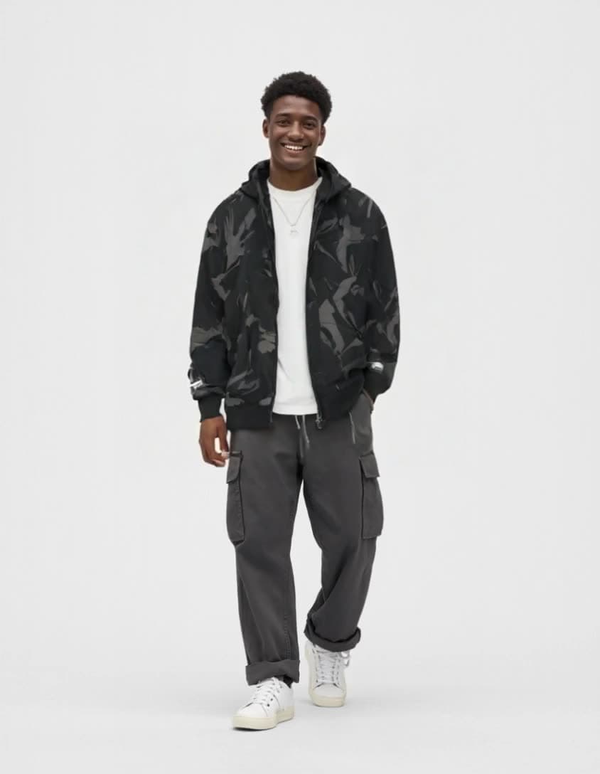 Camo jacket and jogger look on the model